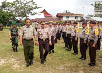 Bupati Kampar Pimpin Apel Gelar Pasukan Operasi Lilin Siak 2017 di Lapangan Pelajar Bangkinang