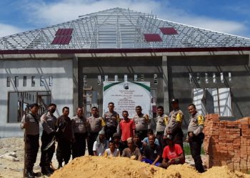 Kapolsek Tambang Kirim Belasan Truk Tanah Timbun dan Alat Berat