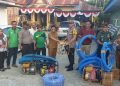 Bantu Penanganan Karhutla, Kapolres Kampar Bersama DLHK Serahkan 10 Unit Mesin Pompa Air
