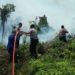 Kapolres Kampar Koordinir Anggota Atasi Kebakaran Lahan di Kawasan Stanum Bangkinang