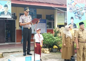 Kapolres Kampar Gelar Police Goes to School di SD 05 Langgini, Berikan Motivasi dan Sosialisasi Soal Kebersihan