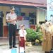 Kapolres Kampar Gelar Police Goes to School di SD 05 Langgini, Berikan Motivasi dan Sosialisasi Soal Kebersihan