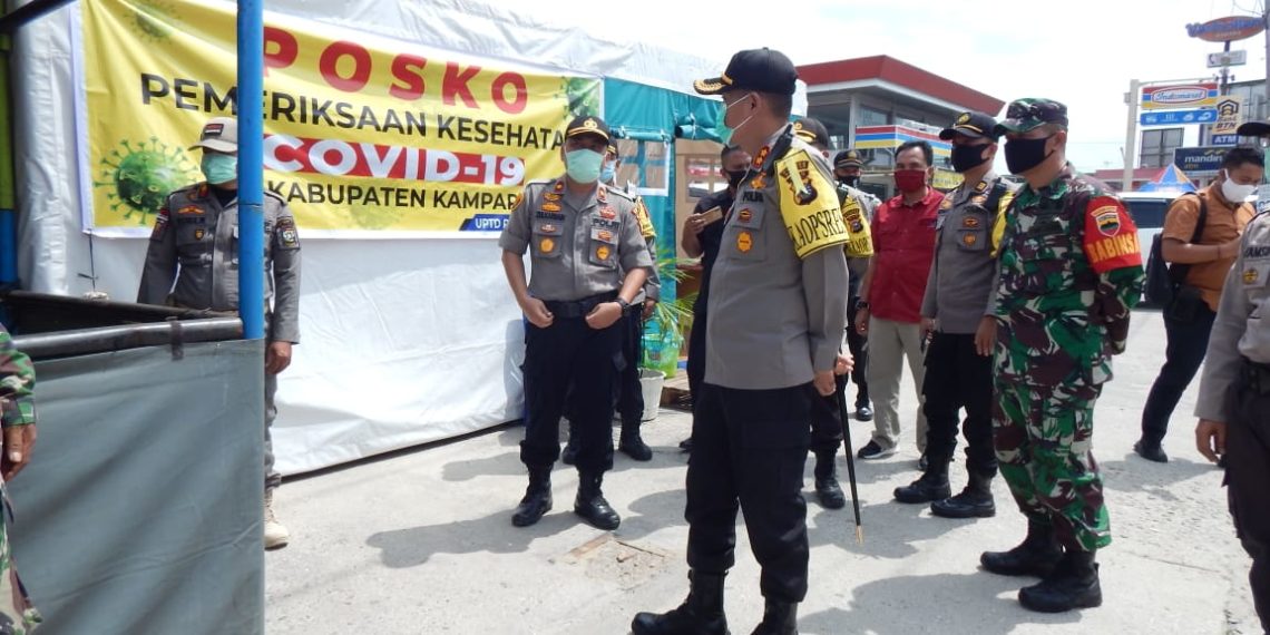 Kapolres Kampar Tinjau Pelaksanaan Pos Check Point Penanggulangan Covid-19