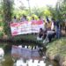 Jelang Hari Bhayangkara ke-74, Polsek Tapung Berikan 10 ribu Bibit Ikan di Desa Sei Lambu Makmur