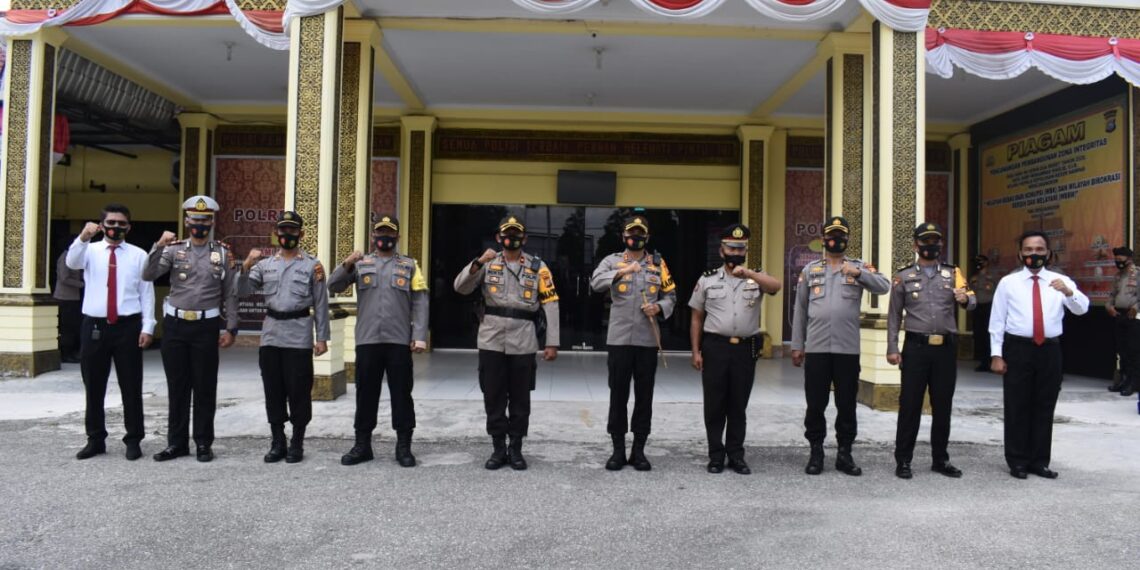 Kapolres Kampar Pimpin Upacara Kenaikan Pangkat Pengabdian Salahsatu Anggotanya
