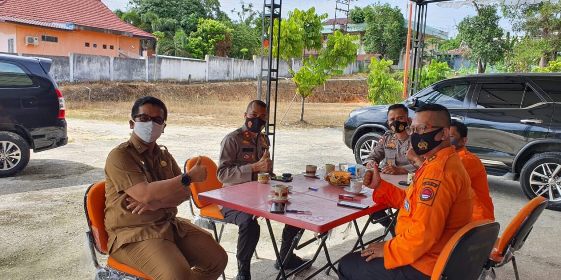 Kapolres Kampar Kunjungi BPBD Kab. Kampar untuk Berkoordinasi tentang Penanganan Covid-19 dan Bencana Alam