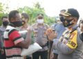 Kapolres Rohul Bagikan Sembako Untuk Masyarakat Terdampak Bencana Banjir di Desa Sontang