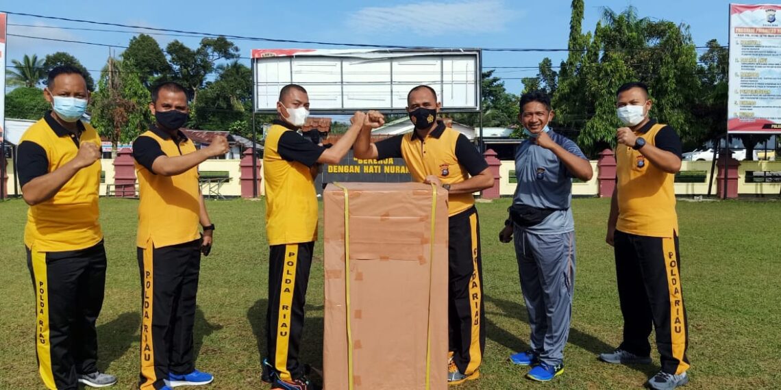 Motivasi Anggotanya, Kapolres Kampar Bagi-bagi Dor Prize Usai Kegiatan Olahraga Rutin