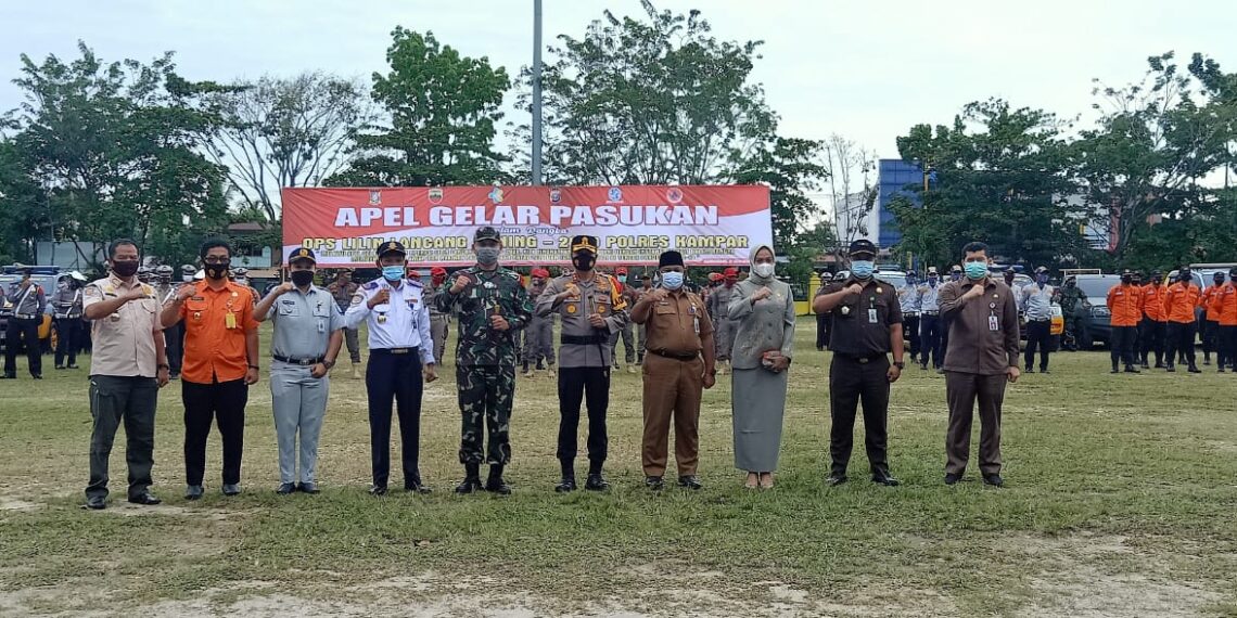 Kapolres Bacakan Amanat Kapolri Pada Apel Gelar Pasukan Ops Lilin Lancang Kuning 2020 Polres Kampar