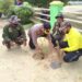 Kapolsek Tapung Gandeng FKPPI Lakukan Penanaman Pohon di Taman Desa Sibuak