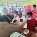 Percepat Vaksinasi, Polres Kampar Bersama RS Pelita Datangi Daerah Terpencil Desa Batu Sanggan