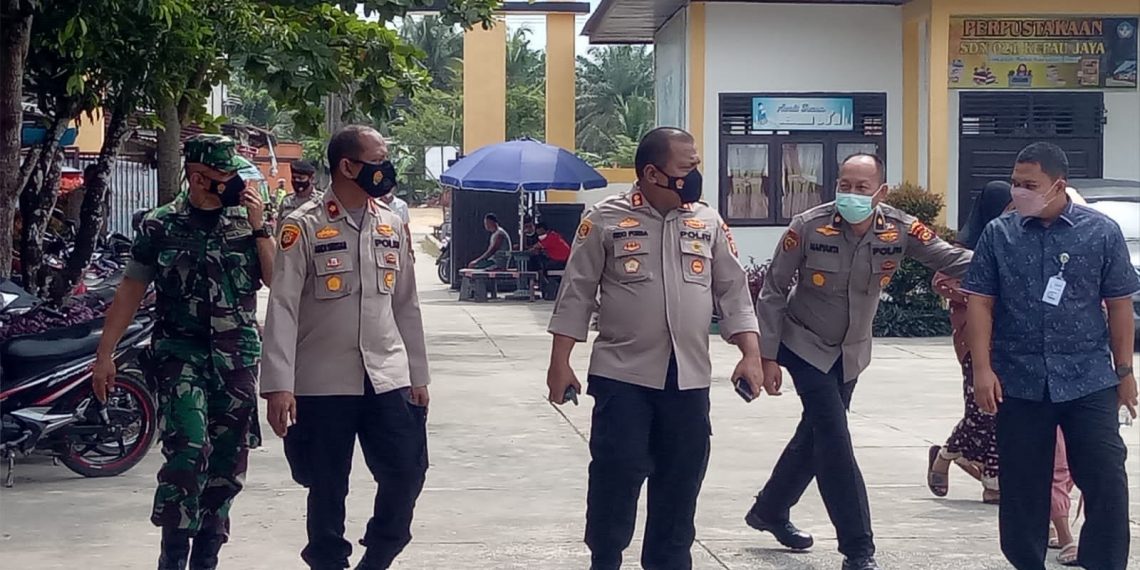 Kapolres Kampar Tinjau Vaksinasi Serentak Se-Indonesia di Desa Kepau Jaya Kec.Siak hulu