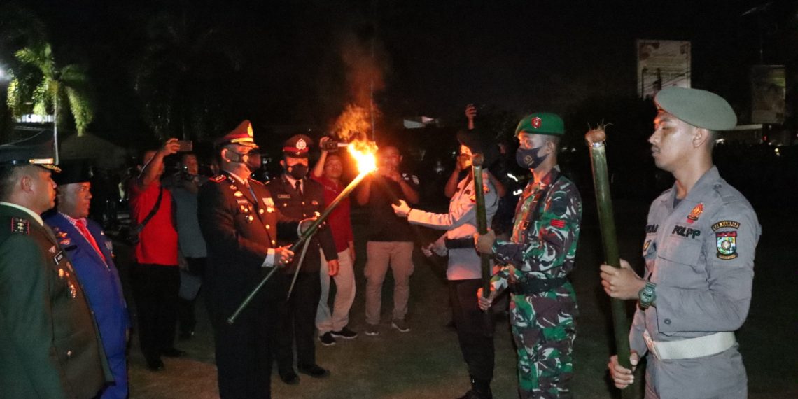Polres Kampar dan Forkopimda Gelar Upacara Taptu Di Halaman Mapolres Kampar