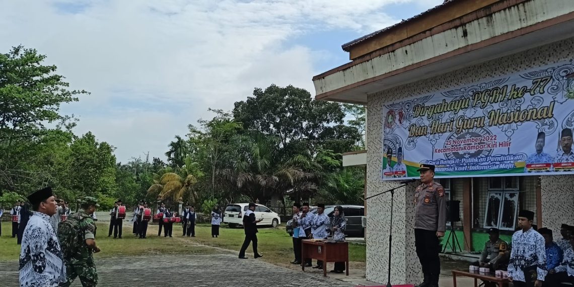 Kapolres Kampar Diwakili Kapolsek Kampar Kiri Hilir Jadi Irup Upacara HGN, Usai Upacara Guru Honorer Diberikan Bansos