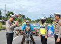 Operasi Keselamatan Lancang Kuning 2023, Satlantas Kampar Bagikan Helm dan Sampaikan Himbauan