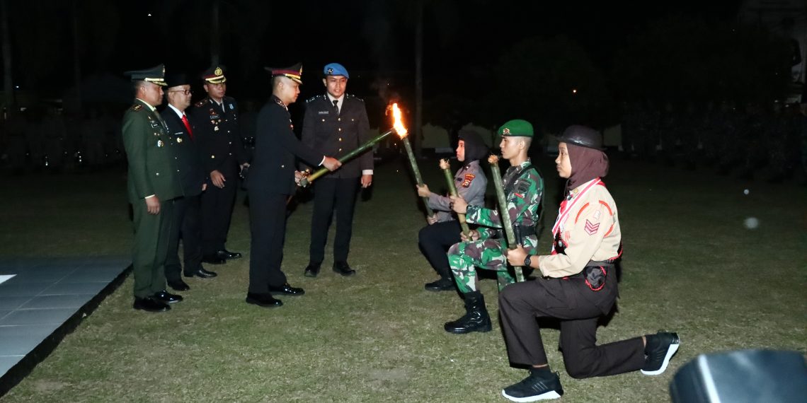 Polres Kampar dan Forkopimda Gelar Upacara Taptu Di Halaman Mapolres Kampar