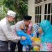 Jumat Barokah, Polsek Siak Hulu Berikan Bansos Kepada Warga Kurang Mampu di Buluh Cina