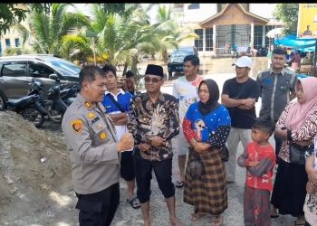 Peduli Korban Banjir, Kapolsek Siak Hulu Salurkan Bantuan Sembako serta himbuan Pemilu Damai