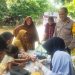Bakti kesehatan terhadap masyarakat yang terdampak banjir oleh Polres Kampar